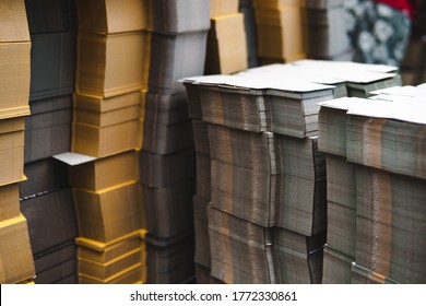 Products And Corrugated Cardboard. Factory For The Manufacture And Processing Of Paper. Copy Space, Stacks. Selective Focus. Capacities And Packaging. Stock