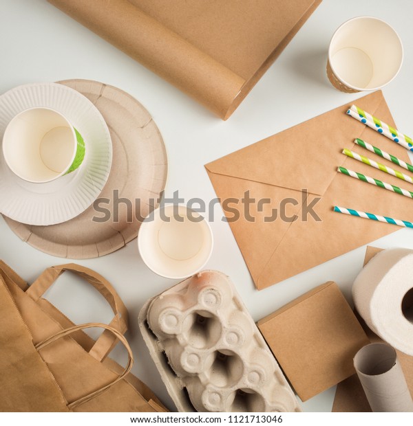 products made from recycled paper: disposable tableware,\
package, box, cardboard, egg packaging, envelope, toilet paper,\
Kraft paper. concept: environmental protection, nature\
conservation, recycle.\
