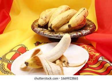 Products From Spain, Canary Plantain, Still Life, Peeled Plantain And A Fruit Bowl Full Of Plantains, On The Flag Of Spain, Product Photo, Bananas, Natural Medicine, 