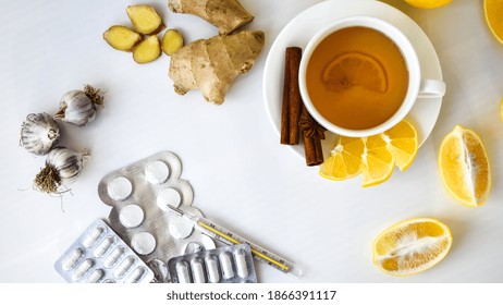 Products For The Treatment Of Common Cold - Lemon, Ginger, Chamomile Tea. Vitamin Natural Drink. Cinnamon Anise Star. Natural Medicine Vs Conventional Medicine