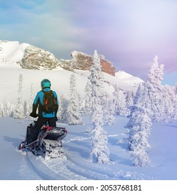 Prof Snowbike. A Beautiful Trip On A Mountain Snowmobile After A Snowstorm In The Mountains.