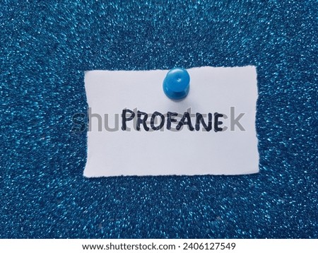 Profane writing on a blue background.