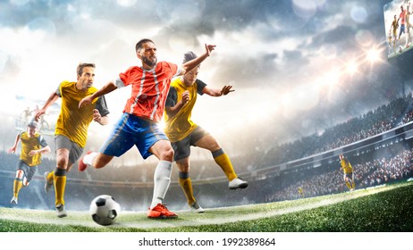 Profeccional soccer players in action on the grand stadium background - Powered by Shutterstock