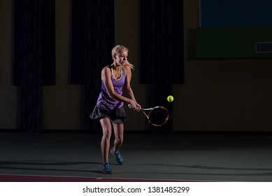 Profesional Tennis Player Hitting Backhand. 