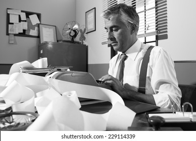 Professional Accountant Working With Adding Machine Tape In Vintage Office.