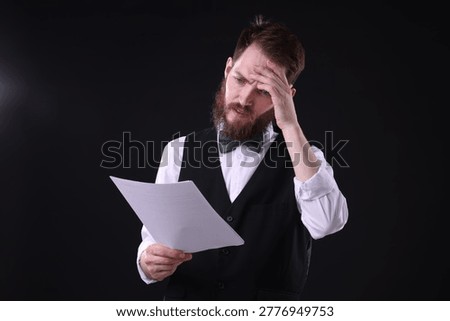 Professional actor with script performing on stage