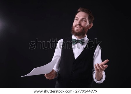 Professional actor with script performing on stage