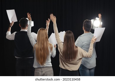 Professional Actors Bowing On Stage In Theatre, Back View