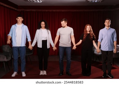 Professional actors bowing on stage in theatre - Powered by Shutterstock