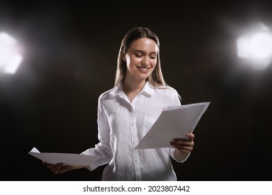 Professional Actress Reading Her Script During Rehearsal In Theatre