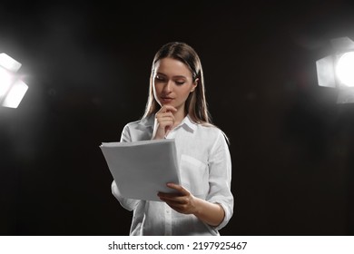 Professional Actress Reading Her Script During Rehearsal In Theatre