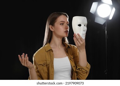 Professional Actress Rehearsing With Mask On Stage In Theatre