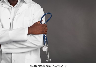 Professional African Doctor On Dark Background