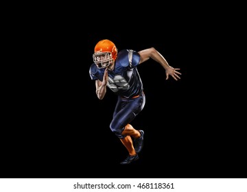 Professional American Football Player In Action Isolated On The Black