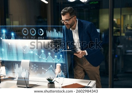 Professional Analyst Assessing Digital Data Visualizations On Modern Office Screens
