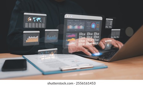 Professional analyzes multiple data visualizations on laptop, integration of technology and analytics in modern business environments for informed decision-making - Powered by Shutterstock