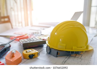 Professional architect working table .construction and safety concept.