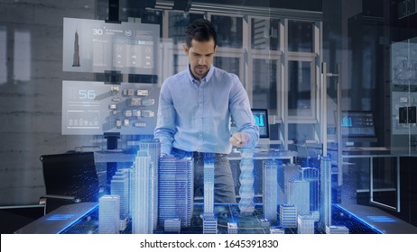 Professional Architect Works With Holographic Augmented Reality 3D City Model Using Gestures. Technologically Advanced Office Use Augmented Virtual Modeling Software Application On Futuristic Display.