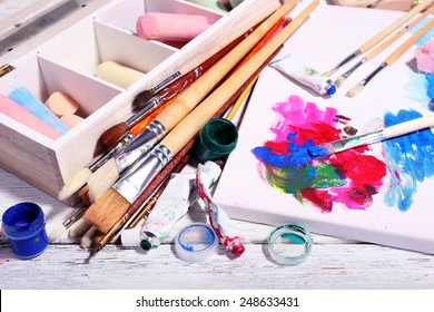 Professional Art Materials On Color Wooden Background