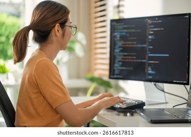 Professional Asian engineer developing software applications, focusing on efficiency, security, and creative solutions in the tech industry.