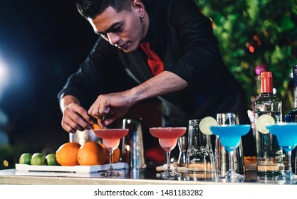 Professional Asian Male Bartender Prepare Mixing Cocktail Drink At Village Night Party Celebration, Extra Work Job Service Customer Outdoor People Lifestyle.