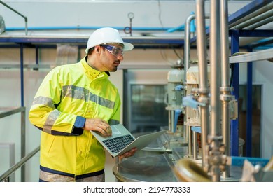 Professional Asian mechanical engineer inspecting the machines in the automated manufacturing factory. Expertise occupation concept. - Shutterstock ID 2194773333