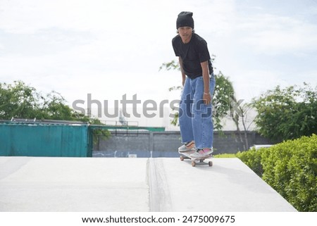 Similar – Junge Person mit Skateboard im Skatepark