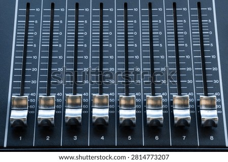 Professional Audio Control Panel Faders in a Row