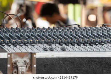 Professional audio mixing console with multiple channel controls for live sound production recording broadcasting and music performance technology