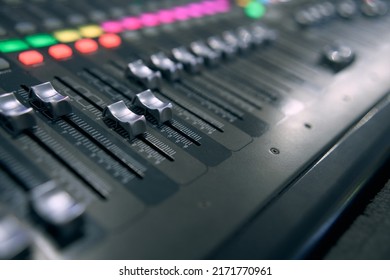 Professional Audio Mixing Console. ​Mixer. Pro Audio Mixing Board Faders And Knobs. Static Shot Of Multi-track Music Recording Equipment Faders And Sliders. 