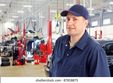 Professional Auto Mechanic In Auto Repair Shop. Garage.