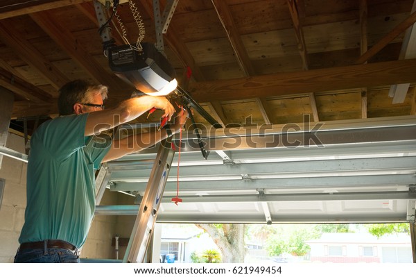 Professional Automatic Garage Door Opener Repair Stock Photo Edit