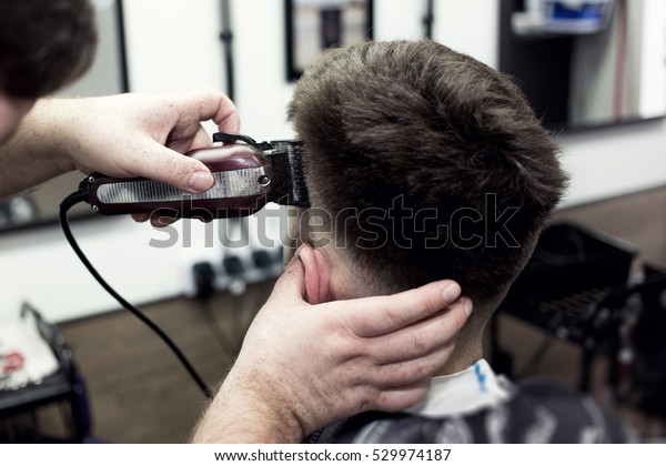 Professional Barber Makes Hairstyle Hipster Closeup Stock Photo