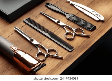 Professional Barber Tools Laid Out on Wooden Surface for Mens Grooming Session - Powered by Shutterstock