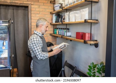 Professional barista preparing to make coffee-based beverage - Powered by Shutterstock