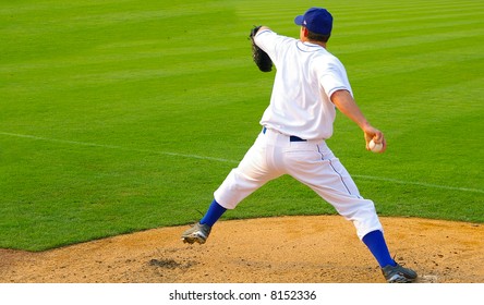 Professional baseball pitcher throwing the ball
