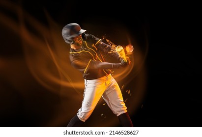 Professional Baseball Player In Sports Equipment Training Alone Isolated On Dark Background With Mixed Light Effect. Sport, Art, Action, Hobby Concept. Poster, Flyer With Sportive Man