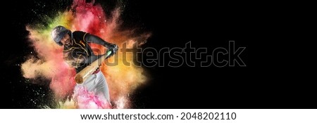 Professional baseball player in sports equipment training alone. Win, winner, victory concepts. Forward. One sportsman in explosion of colored neon powder isolated on dark background. Splashing of