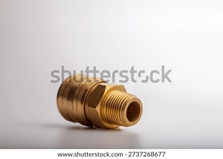 Professional brass quick release coupler with male thread for compressed air systems and hydraulic tools, industrial connector hardware for pneumatic equipment isolated on white background