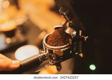 Professional brewing, coffee bar details. Espresso coffee pouring from espresso machine. Barista details in cafe - Powered by Shutterstock