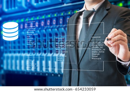Professional businessman system analysis design and drawing database table with server storage technology background