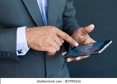 Professional Businessman Using A Smart Mobile Phone