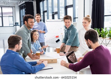 professional businesspeople discussing and brainstorming together on workplace in office, young professional group concept - Shutterstock ID 641025154