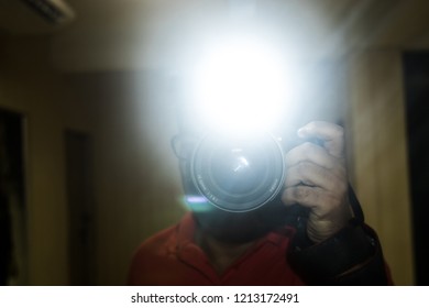 professional camera flash lighting during taken photograph