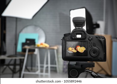 Professional Camera On Tripod In Studio, Closeup. Food Photography