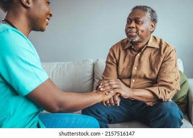 Professional Care For Elderly At Nursing Homes. Cropped Shot Of A Female Nurse Hold Her Senior Patient's Hand. Close-up Of Home Caregiver And Senior Woman Holding Hands