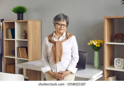 Professional Career, Elderly Staff And Business. Smiling Senior Female Office Worker, Accountant, Aged Lady Ceo Boss Chief Or Old Businesswoman Entrepreneur Standing Looking At Camera Portrait