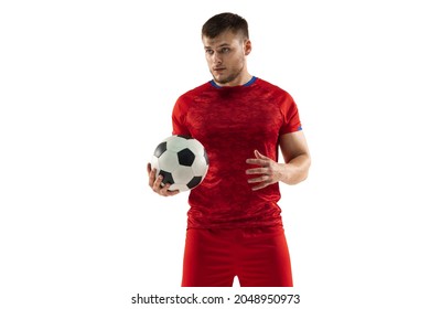 Professional caucasian football soccer player standing with ball isolated on white studio background. Concept of sport, movement, energy and dynamic, healthy lifestyle. - Powered by Shutterstock