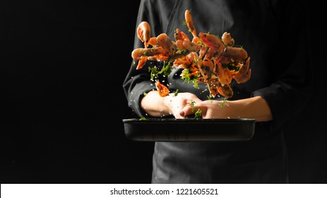 Professional chef prepares shrimps with greens. Cooking seafood, healthy vegetarian food, and food on a dark background. Horizontal view. - Powered by Shutterstock