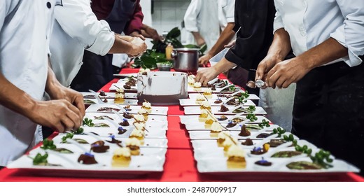 Professional Chefs Collaborating on Gourmet Plating in Restaurant Kitchen - Powered by Shutterstock